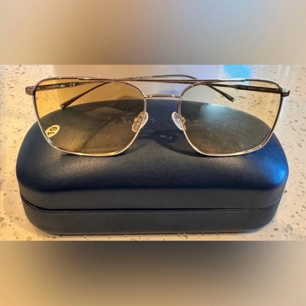 Lacoste Gold Frame Sunglasses with Light Yellow Lenses